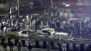 Rescue teams inspect the mangled remains of a car after a powerful blast near Delhi’s Red Fort on November 10, 2025. Nine were killed and 20 injured in the explosion.