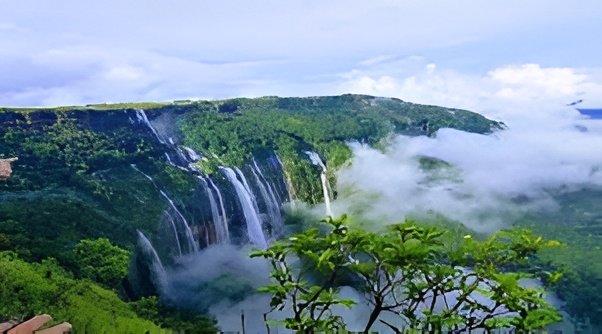 Seven Sisters Waterfall in Meghalaya splits into seven stunning streams cascading down a massive limestone cliff during the monsoon.