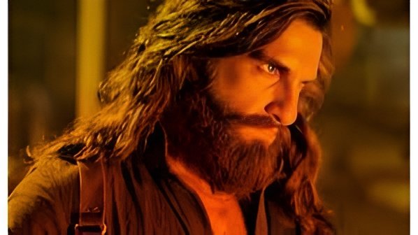 Ranveer Singh in a powerful still from Dhurandhar, now the highest-grossing Indian film of 2025 worldwide.