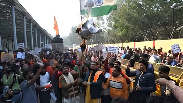 Protesters clash with police outside the Bangladesh High Commission in Delhi over the killing of a Hindu man in Bangladesh.