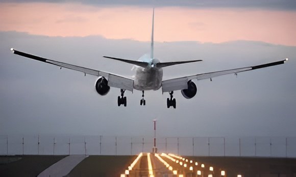 Security personnel inspect a British Airways aircraft at Hyderabad airport after a bomb threat email was received.