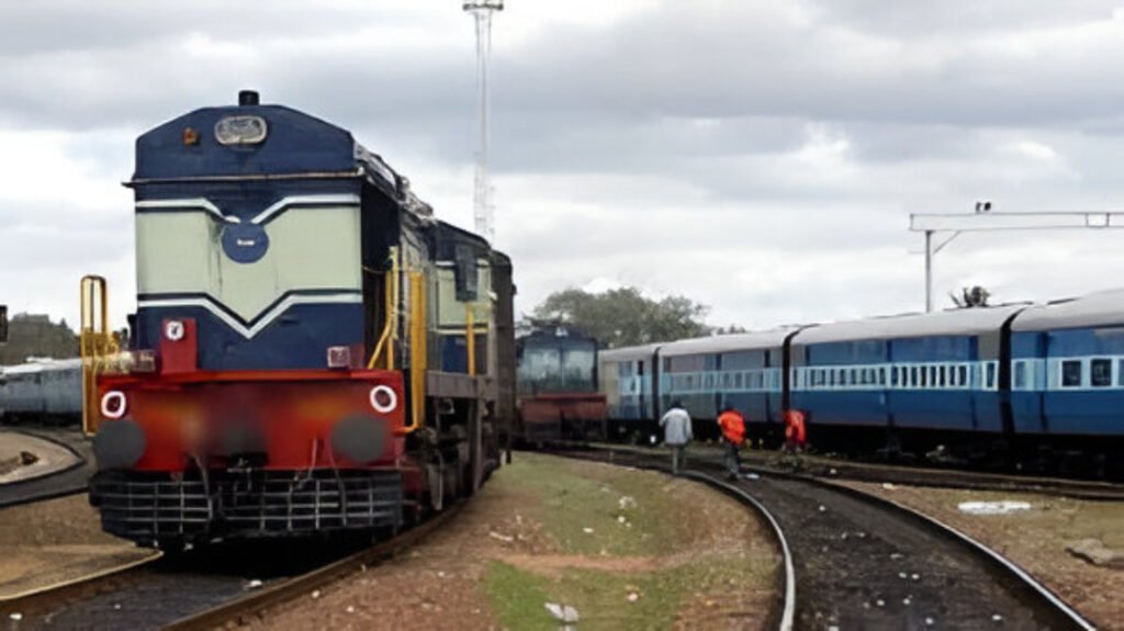 Passengers check updated train schedules as Indian Railways implements timing changes from January 1.