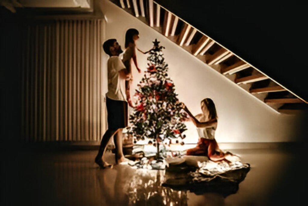 Family decorating Christmas tree, sharing love and joy this festive season.