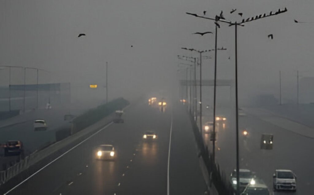 Thick fog engulfs Delhi roads and buildings as severe AQI and low visibility disrupt daily life across the NCR.