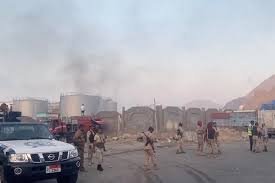 Smoke rises over Yemen’s port city of Mukalla following Saudi airstrikes as regional tensions flare between Saudi Arabia and the UAE.