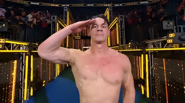 John Cena waves goodbye to fans after his final WWE match, marking the end of an iconic era in professional wrestling.