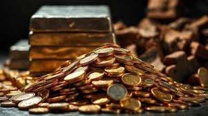 Gold bars and coins symbolize the start of 2026 with rising gold prices and fluctuating silver rates in Indian markets.