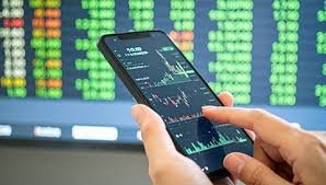 Traders watch market movements as Sensex and Nifty slip in early trade amid foreign investor selling and global trade concerns.