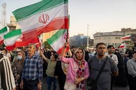 Iranian protesters gather in Tehran amid internet shutdown and rising tensions over potential US military action.