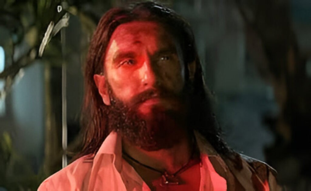 Ranveer Singh in a still from Dhurandhar, as the film races towards the ₹1,300 crore worldwide box office milestone.