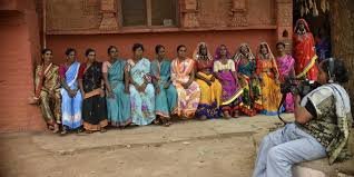 Villagers and women’s groups conducting a survey in Telangana to identify families in extreme poverty under the new government scheme.