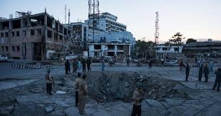 Security personnel at the site of a blast in Kabul after ISIS claimed responsibility for an attack on a Chinese restaurant.