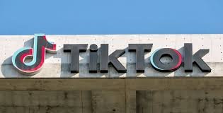 TikTok signage seen outside its office as the company completes a US ownership deal through a ByteDance-led joint venture.