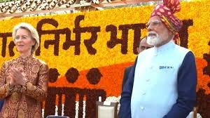 Ursula von der Leyen, chief guest at India’s 77th Republic Day, arrives at Kartavya Path in a maroon-and-gold brocade bandhgala with off-white trousers.