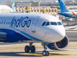 An IndiGo aircraft on the tarmac as the airline suspends select international routes due to airspace restrictions linked to Iran security concerns.