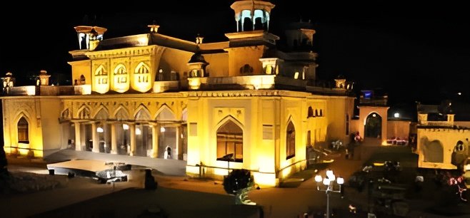 Chowmahalla Palace lit at night during The Chowmahalla Experiences, offering heritage tours, music, and royal dining.