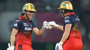 Grace Harris and Smriti Mandhana celebrate RCB’s emphatic win over UP Warriors in WPL-4 league match.