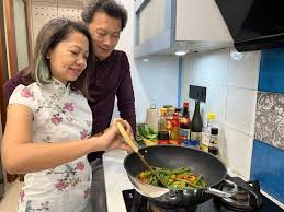 Women of Kolkata’s Chinatown preparing traditional mafaa cookies for Chinese New Year celebrations.