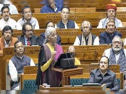 Finance Minister Nirmala Sitharaman presenting Budget 2026 with key direct tax reforms for taxpayers.